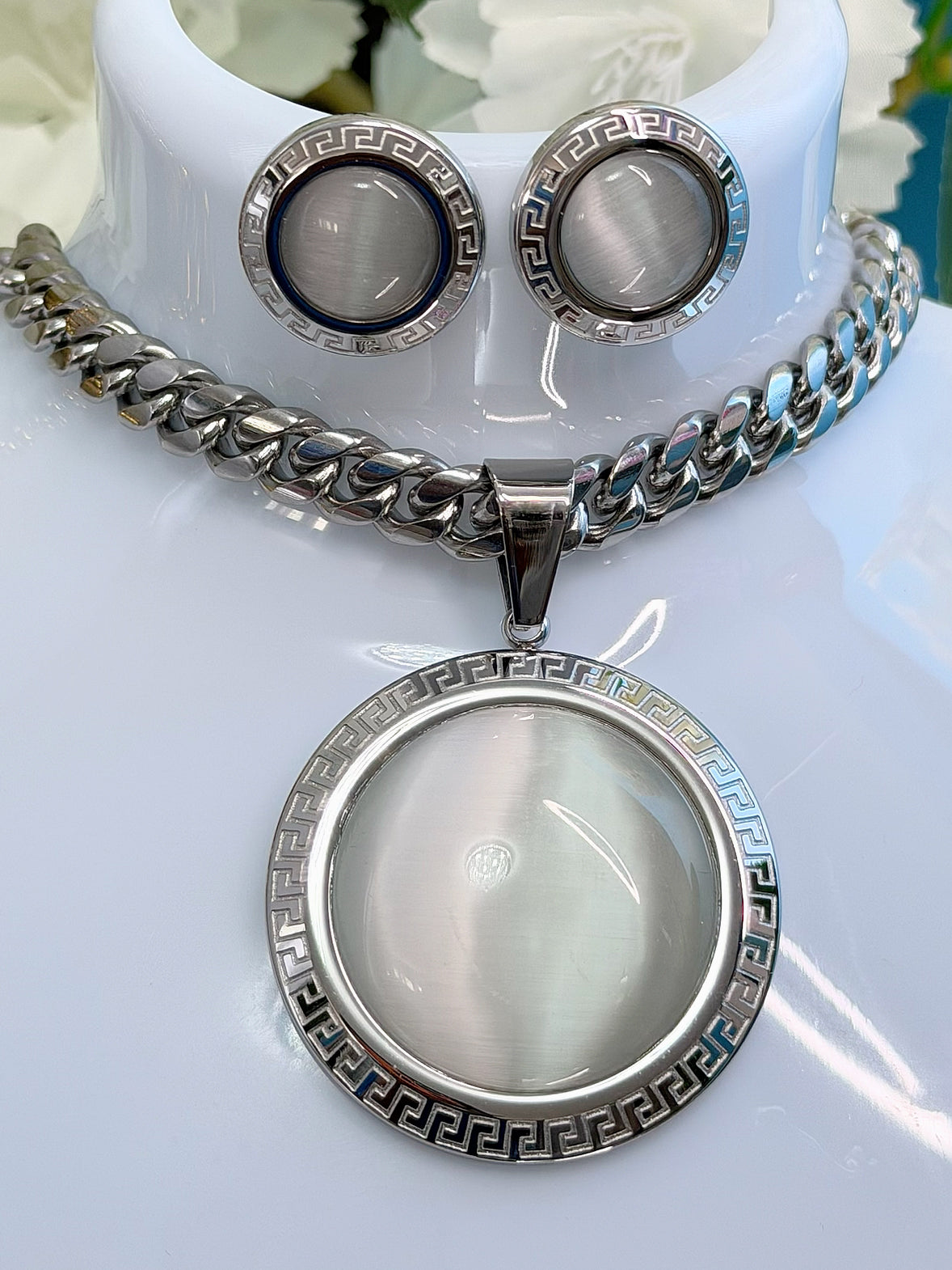 Glass pendant with matching earrings