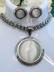 Glass pendant with matching earrings